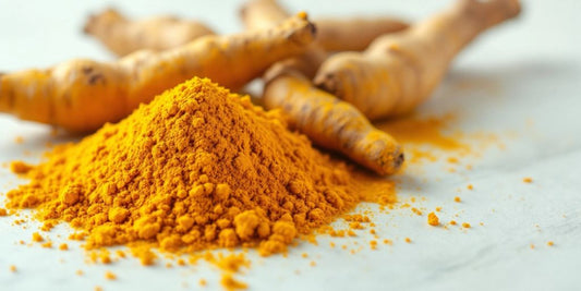 Turmeric roots and curcumin powder on a natural background.
